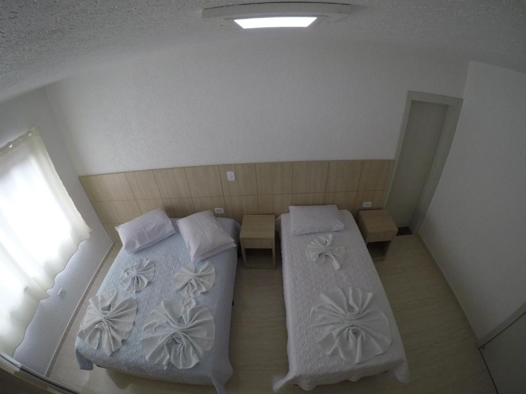 Postel nebo postele na pokoji v ubytování Hotel Dove