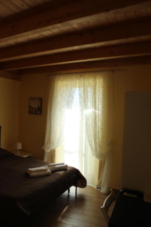 Postel nebo postele na pokoji v ubytování Terrazza Sul Rabato