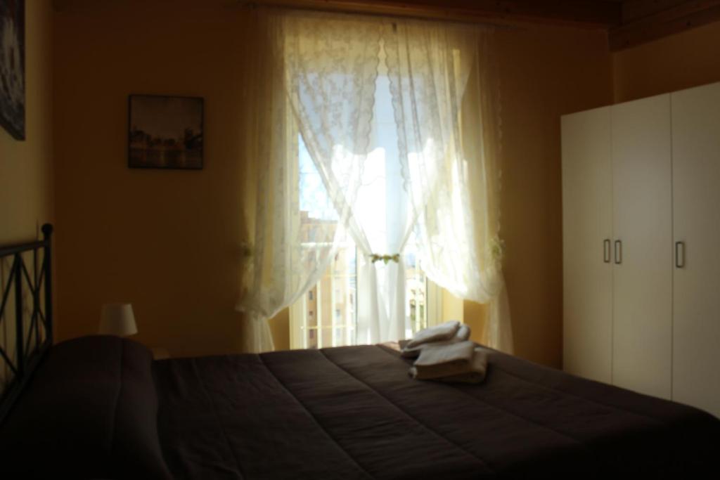 Postel nebo postele na pokoji v ubytování Terrazza Sul Rabato