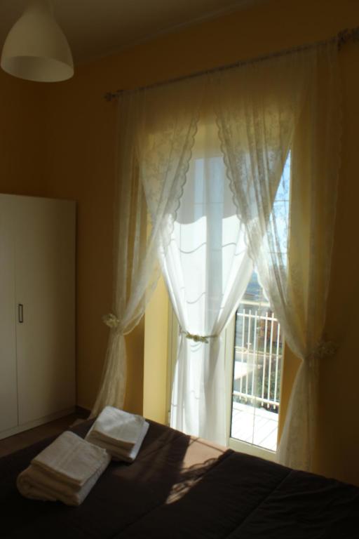 Postel nebo postele na pokoji v ubytování Terrazza Sul Rabato