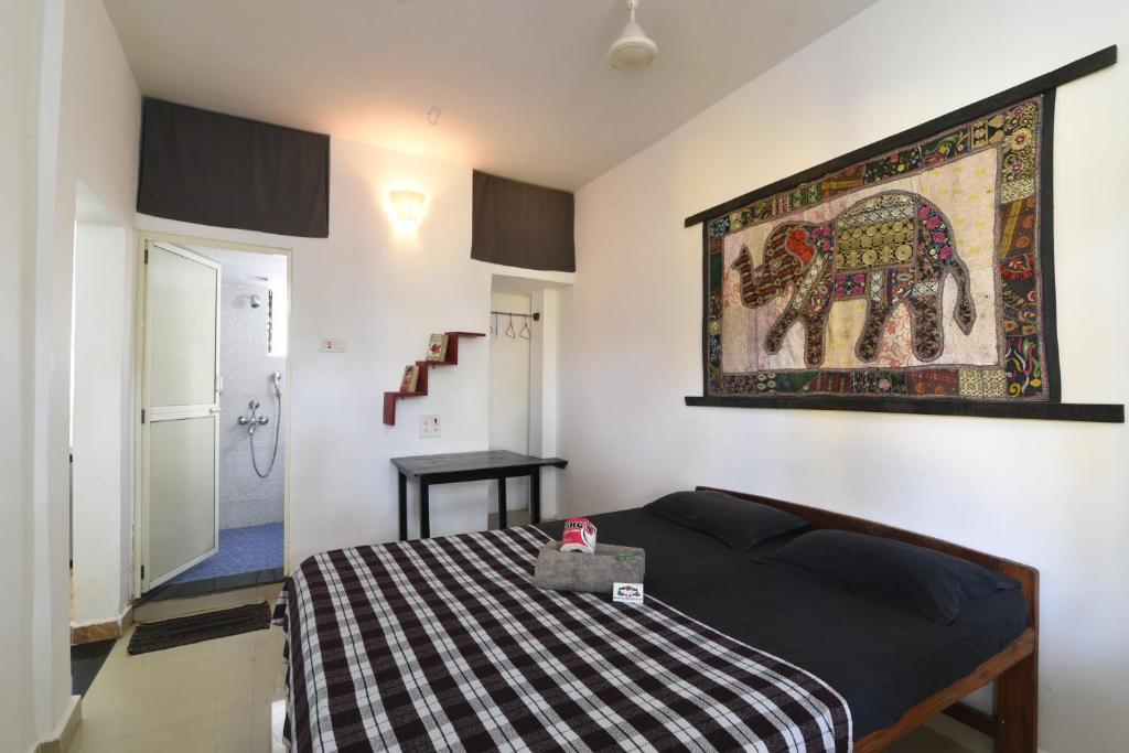 Postel nebo postele na pokoji v ubytování Cactus Guesthouse