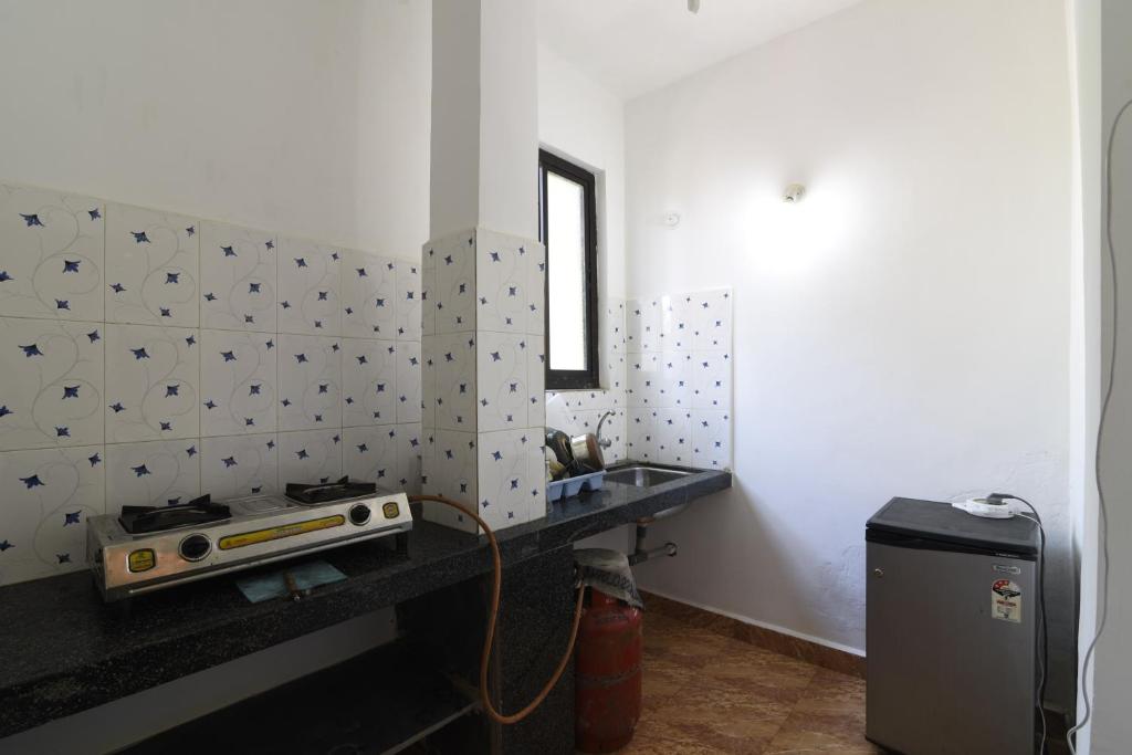 Kuchyň nebo kuchyňský kout v ubytování Cactus Guesthouse