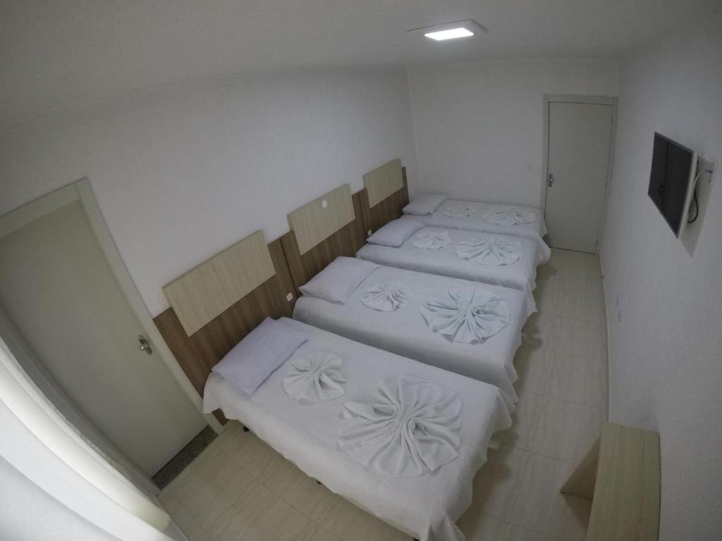 Postel nebo postele na pokoji v ubytování Hotel Dove