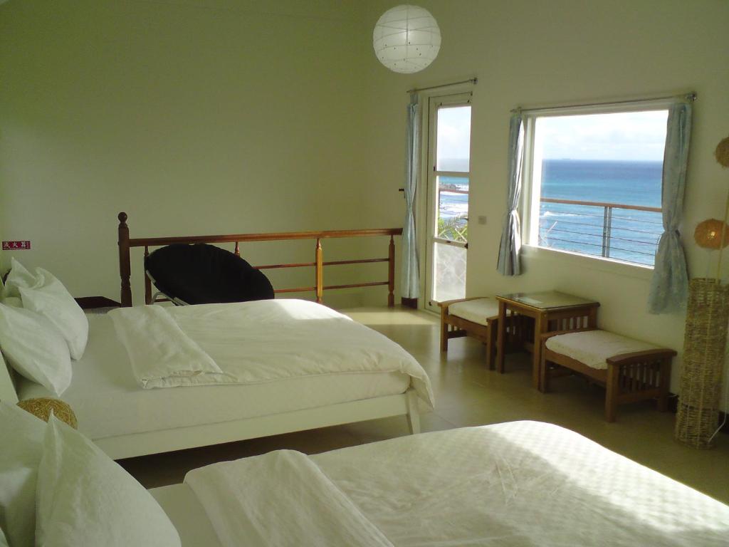 Postel nebo postele na pokoji v ubytování Sun Motel