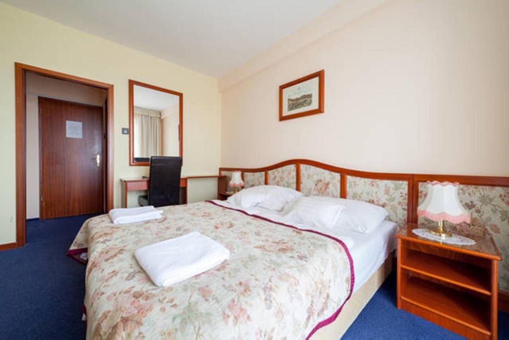 Posteľ alebo postele v izbe v ubytovaní Hotel Bobbio