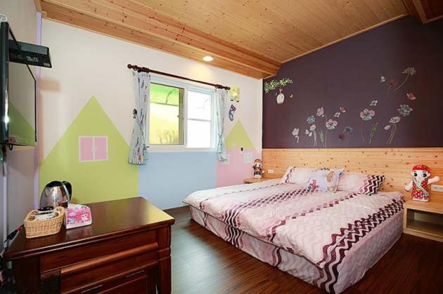 Voodi või voodid majutusasutuse Alishan Shanyunhua B&B Homestay toas