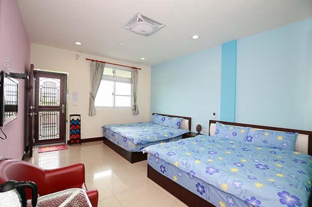 Voodi või voodid majutusasutuse Alishan Shanyunhua B&B Homestay toas