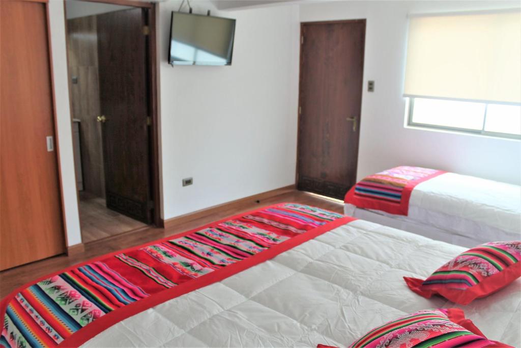 Postel nebo postele na pokoji v ubytování Hotel Samaña