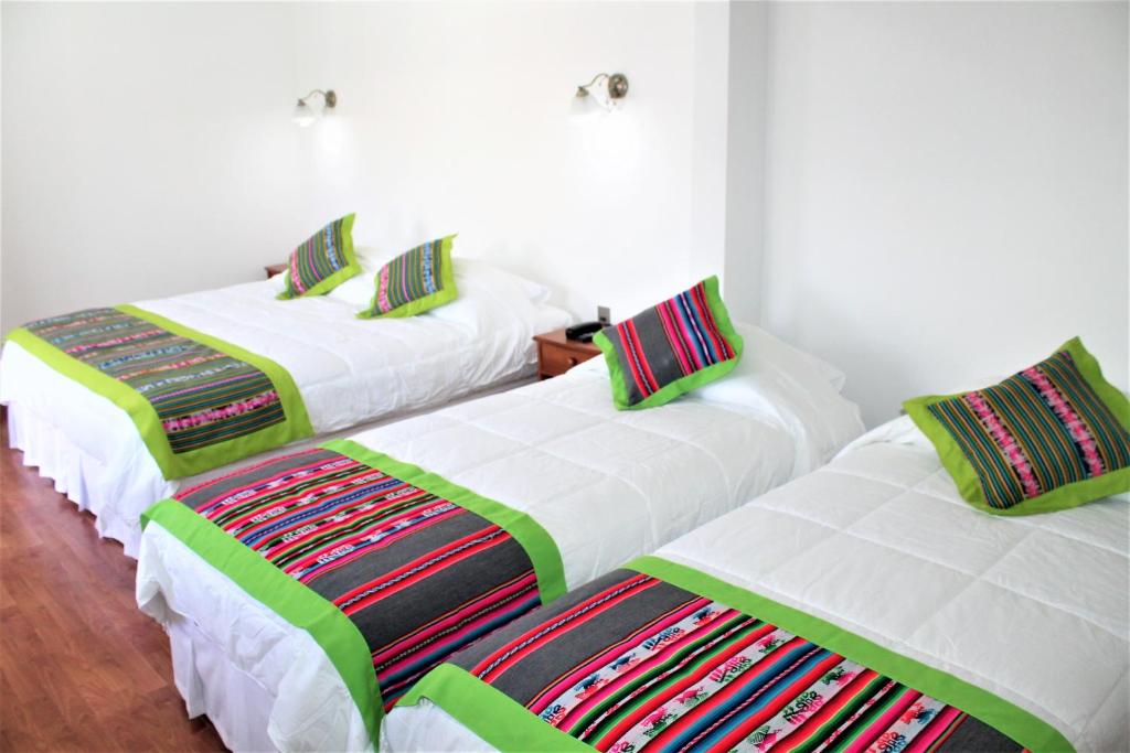 Postel nebo postele na pokoji v ubytování Hotel Samaña