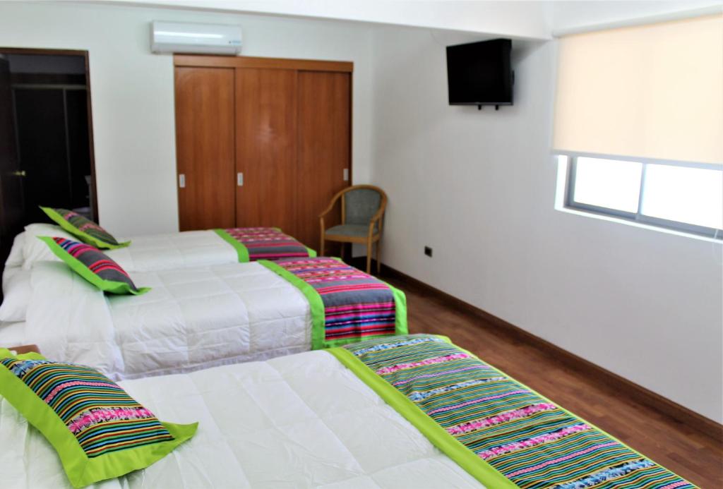 Postel nebo postele na pokoji v ubytování Hotel Samaña
