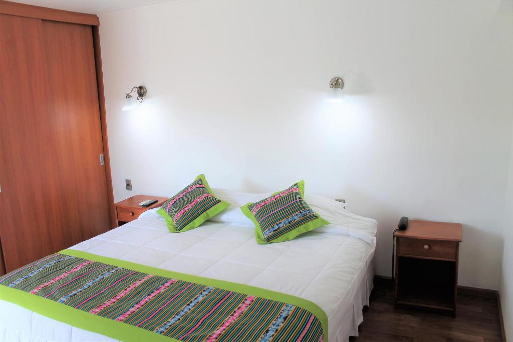 Postel nebo postele na pokoji v ubytování Hotel Samaña