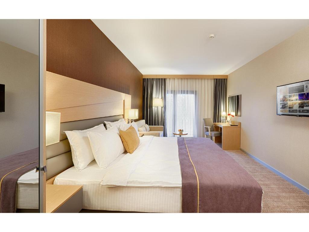 En eller flere senger p&aring; et rom p&aring; Kordon Hotel &Ccedil;ankaya