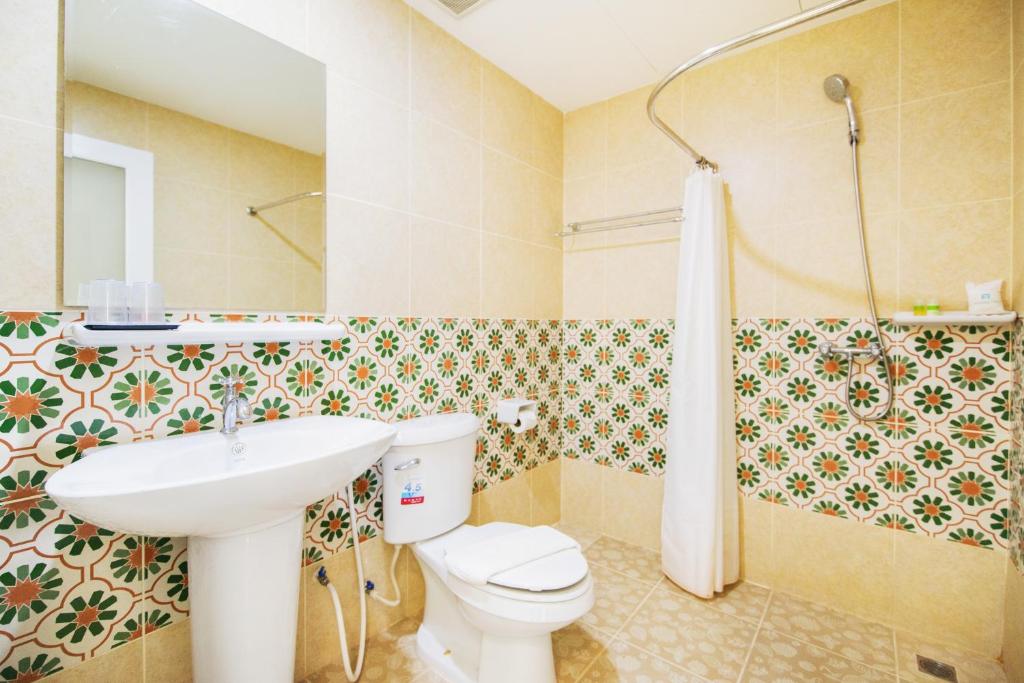 Koupelna v ubytování Le Hua Hotel