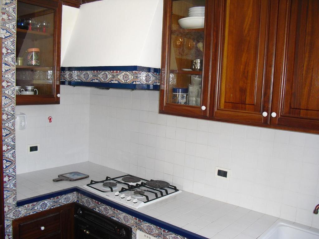 Kuchyň nebo kuchyňský kout v ubytování Casa Mare San Vito Lo Capo