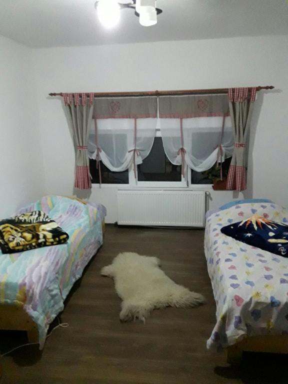 Postel nebo postele na pokoji v ubytování Perla Neagră Lotus Spa