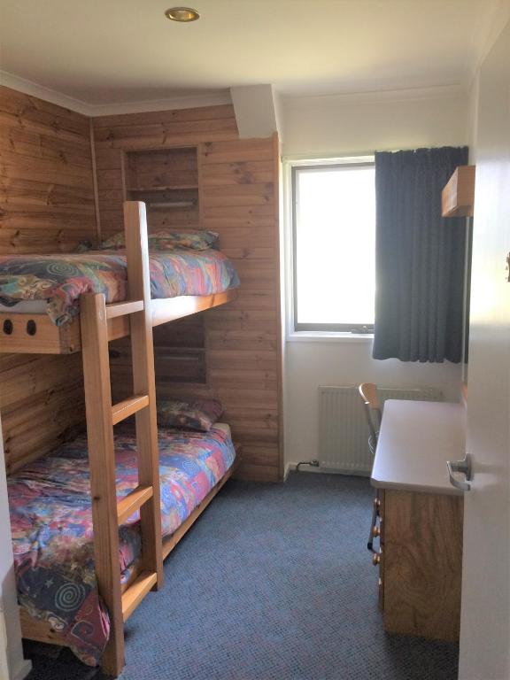 Postel nebo postele na pokoji v ubytování TERAMA Ski Lodge