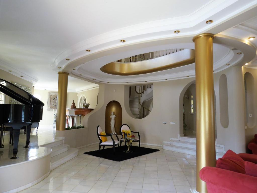 Posezení v ubytování Villa Moments - Guest House