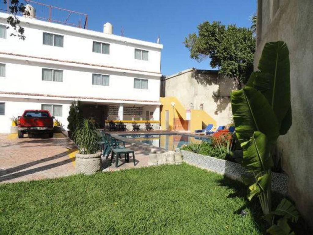 Zahrada ubytování Hotel Las Dalias Inn