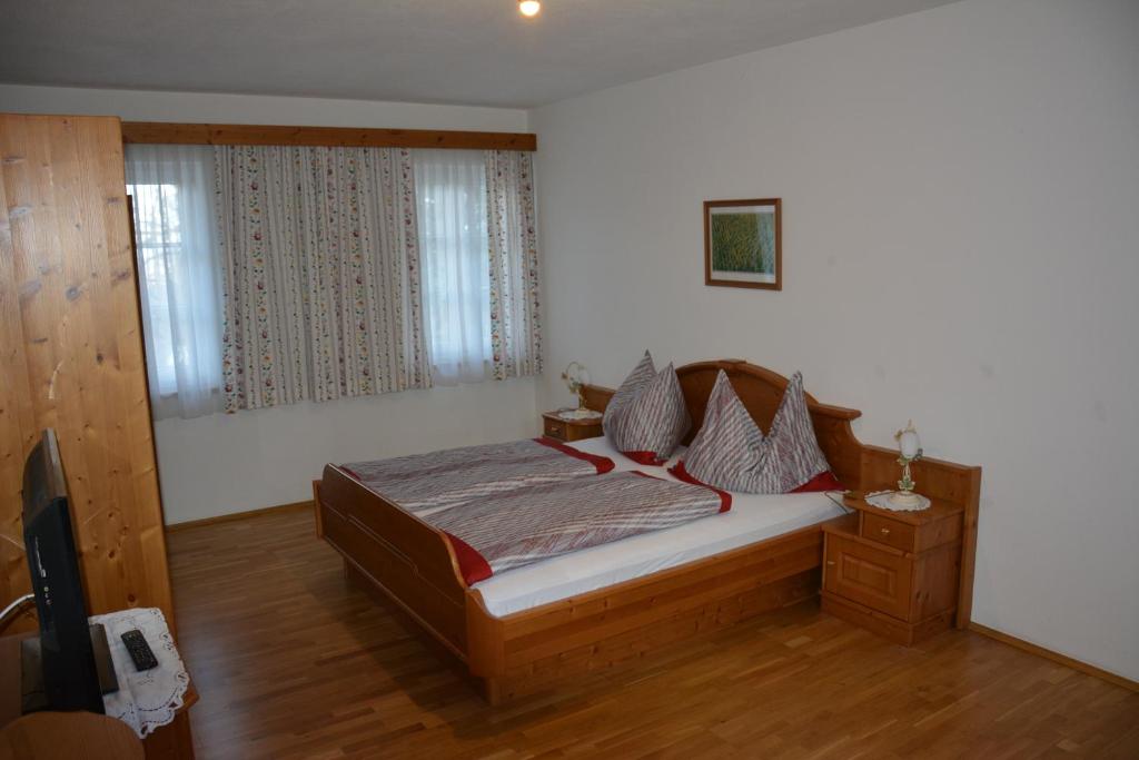 Postel nebo postele na pokoji v ubytování Weingut Seiner vlg. Kraxner