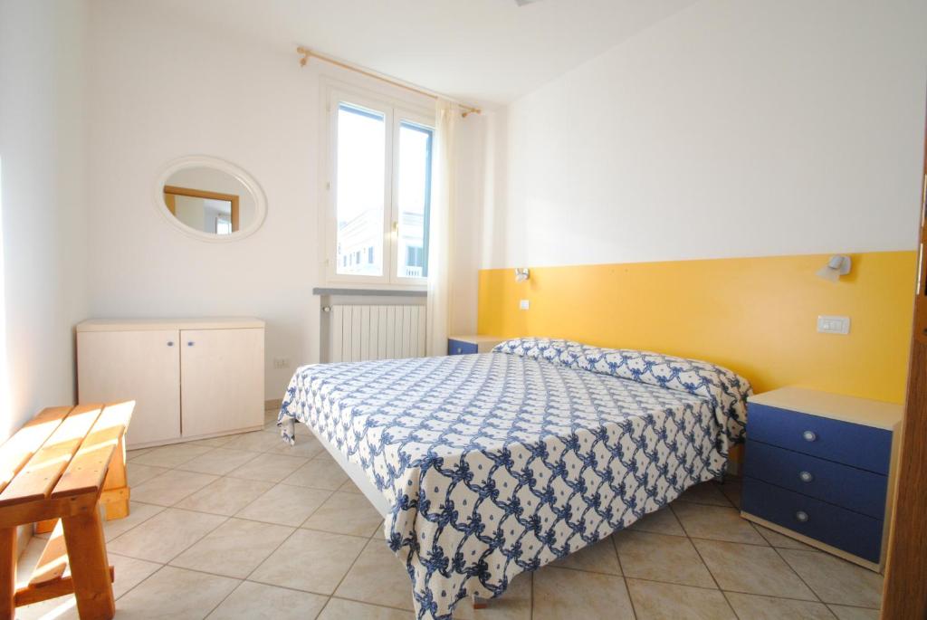 A bed or beds in a room at Villa Fiorella