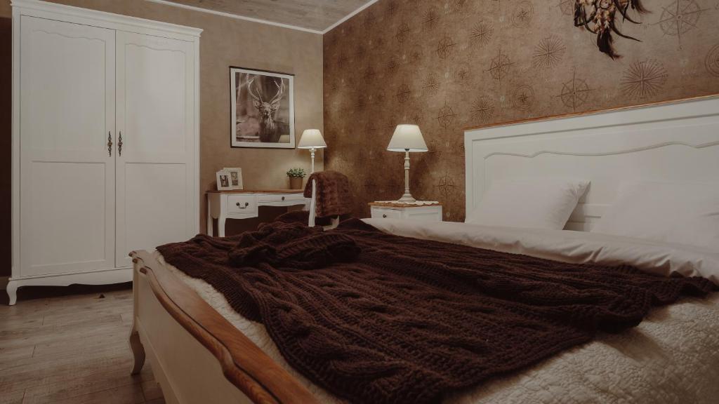 Posteľ alebo postele v izbe v ubytovaní Main Street Apartments