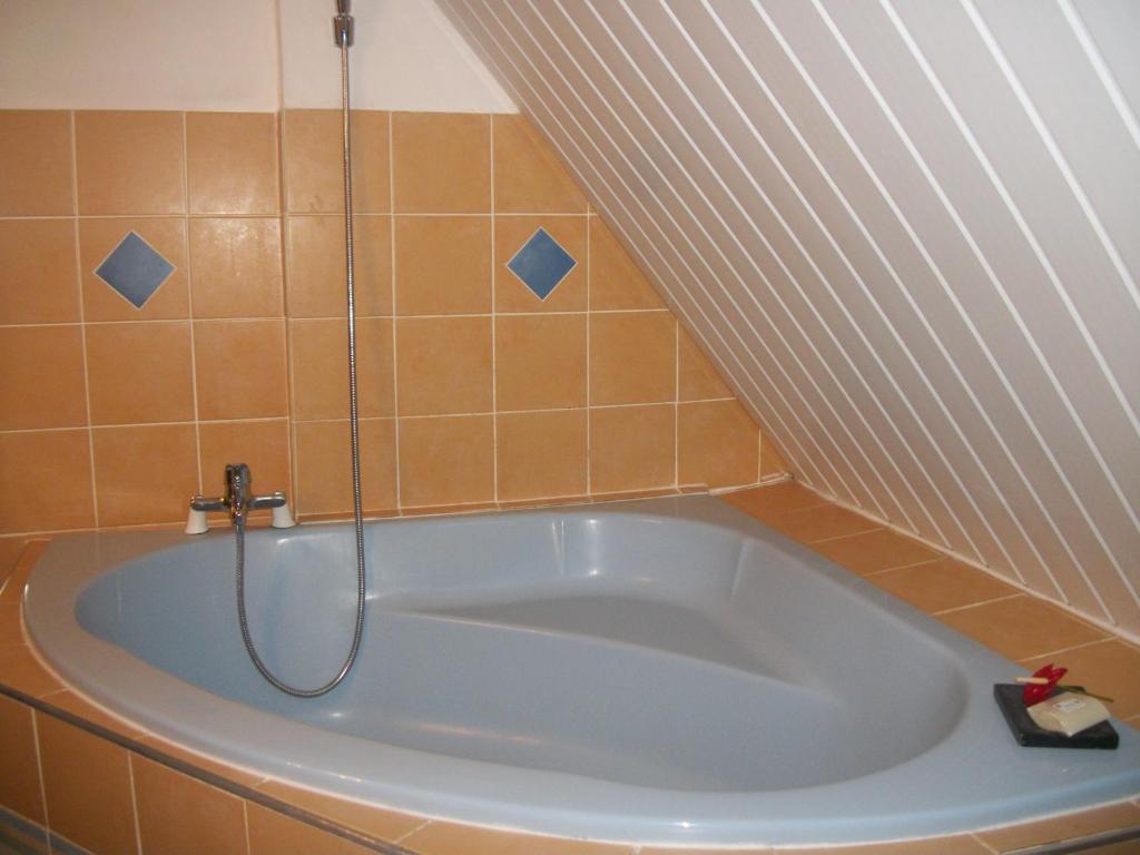 Koupelna v ubytování Le Rubinjo - Appartement d'hôtes