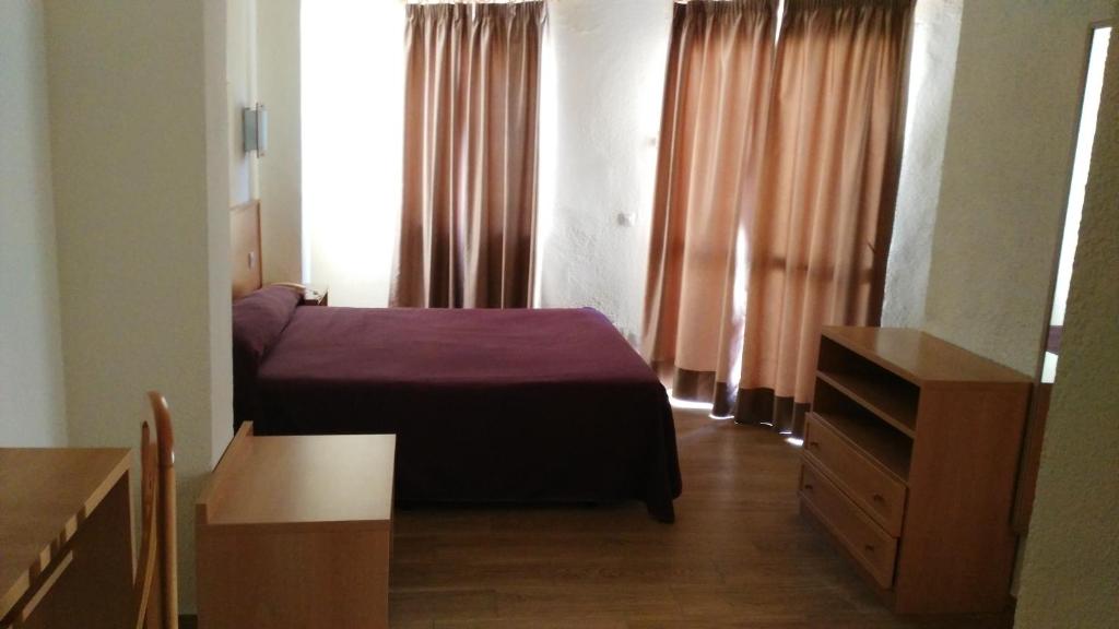 Postel nebo postele na pokoji v ubytování Kristal