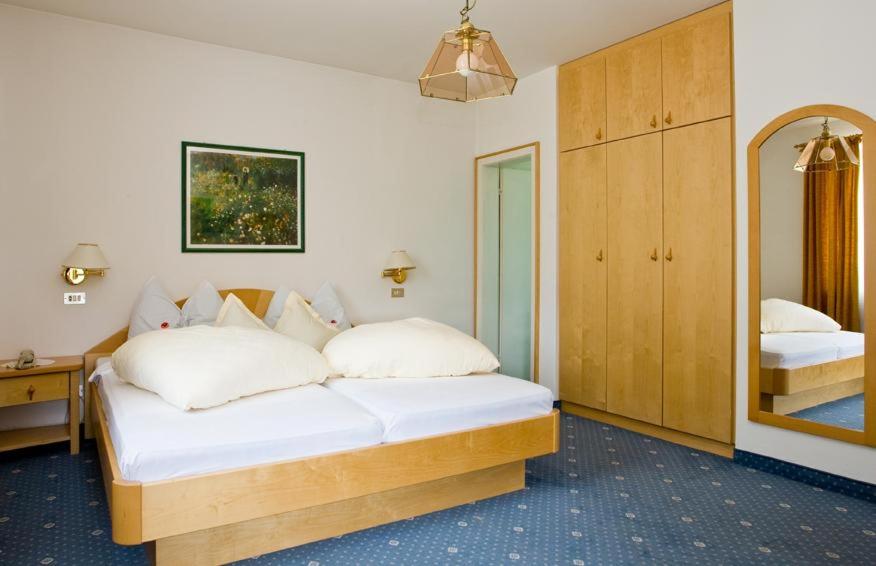 Postel nebo postele na pokoji v ubytování Chalet Anna