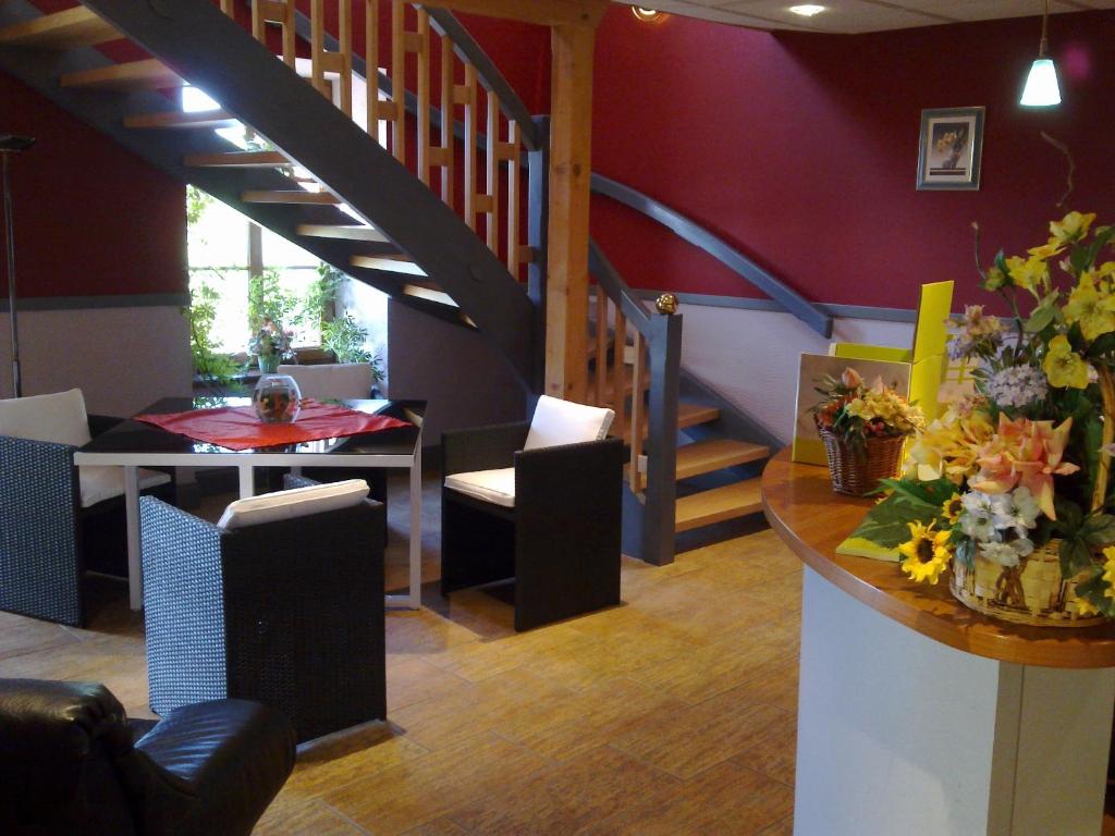 Posezení v ubytování Logis Hotel Les Vosges