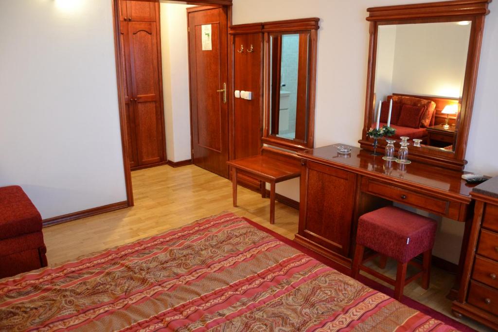Postel nebo postele na pokoji v ubytování Hotel Dva Bisera