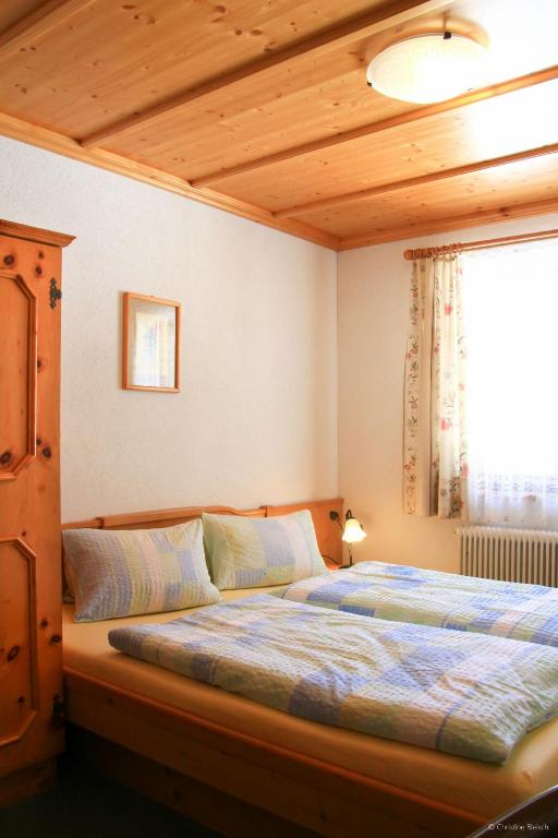 Posteľ alebo postele v izbe v ubytovaní Apartment Bleisch