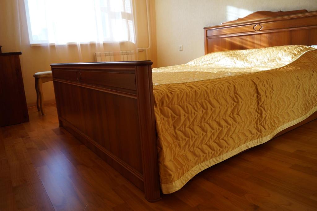 Postel nebo postele na pokoji v ubytování Dauman Apartment