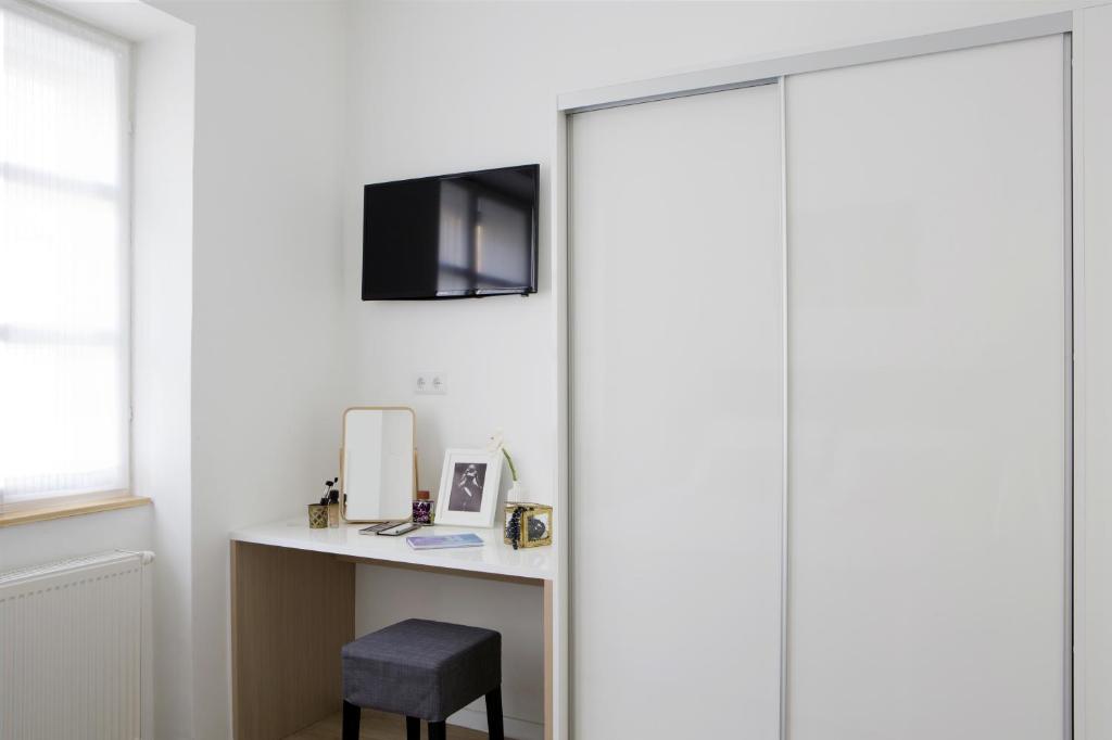 Telewizja i/lub zestaw kina domowego w obiekcie Premium Class Apartments