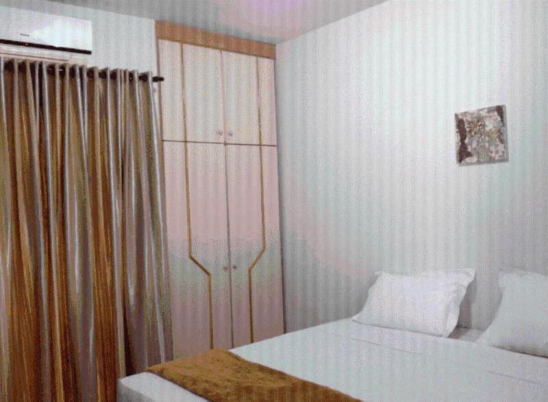 Postel nebo postele na pokoji v ubytování Iguassu Central Flats