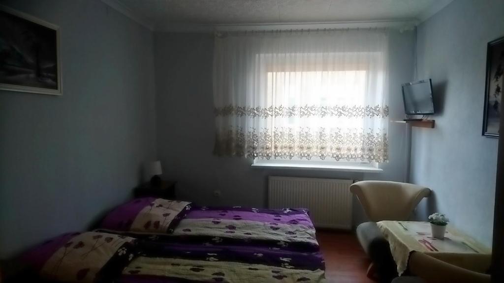 Postel nebo postele na pokoji v ubytování Willa Sarenka