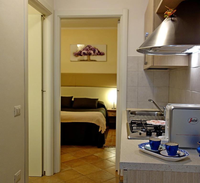 Kuchyň nebo kuchyňský kout v ubytování Eden Park Resort