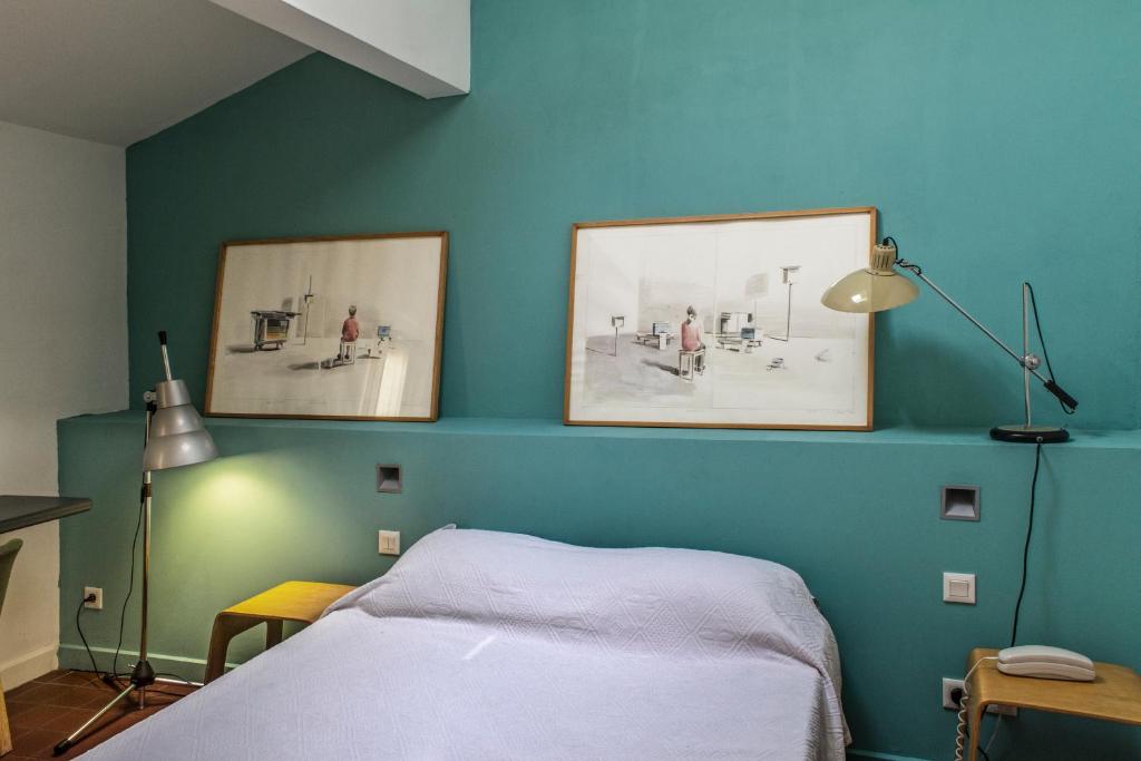 Postel nebo postele na pokoji v ubytování Hotel Burrhus