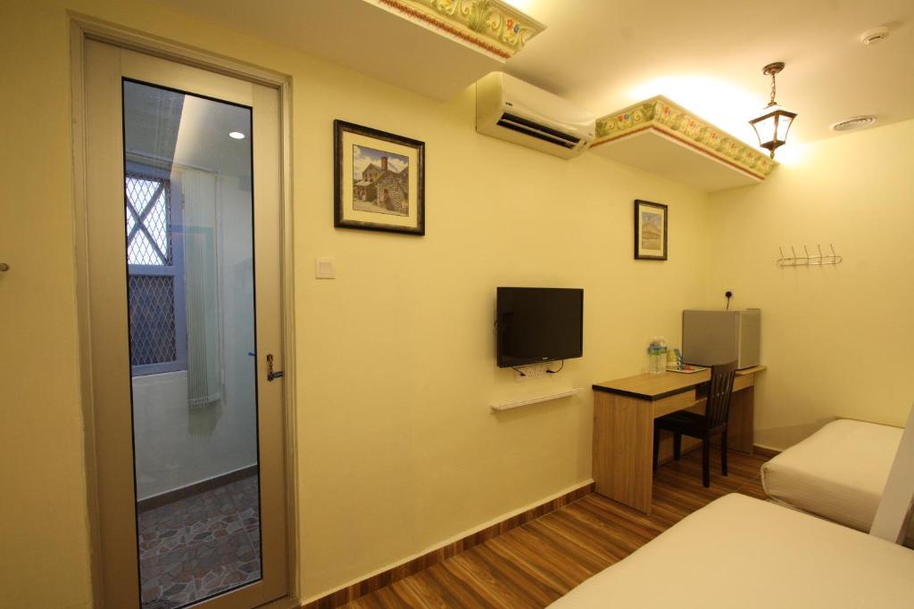 TV a/nebo společenská místnost v ubytování Shamrock Guest House II