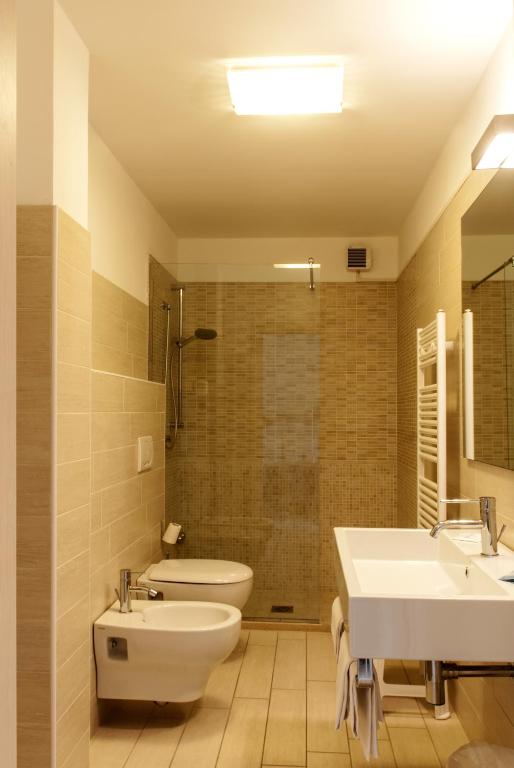 Koupelna v ubytování Hotel Elite