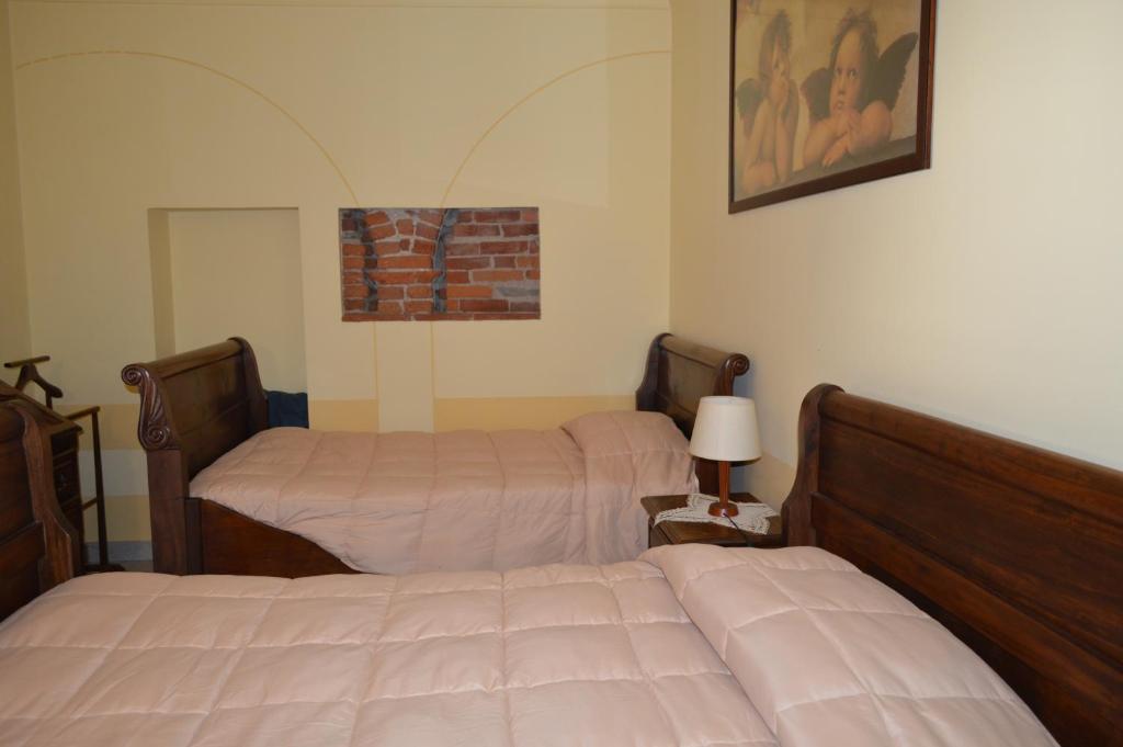 Postel nebo postele na pokoji v ubytování Il Borgo
