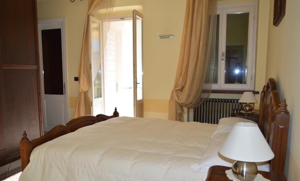 Postel nebo postele na pokoji v ubytování Il Borgo