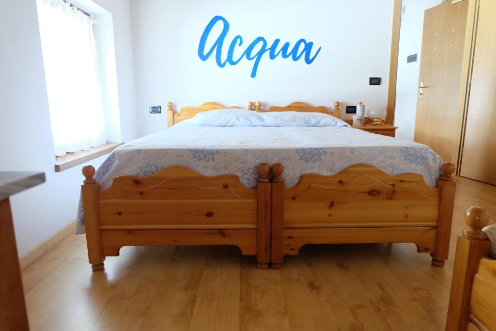 Postel nebo postele na pokoji v ubytování Santorsola Relax Hotel