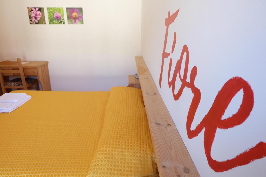 Postel nebo postele na pokoji v ubytování Santorsola Relax Hotel