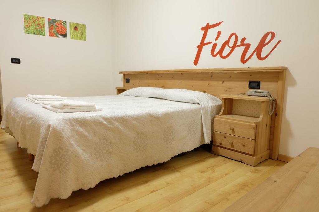 Postel nebo postele na pokoji v ubytování Santorsola Relax Hotel