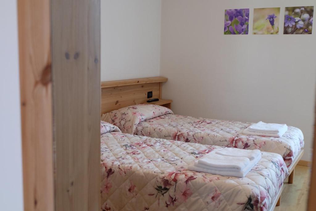 Postel nebo postele na pokoji v ubytování Santorsola Relax Hotel