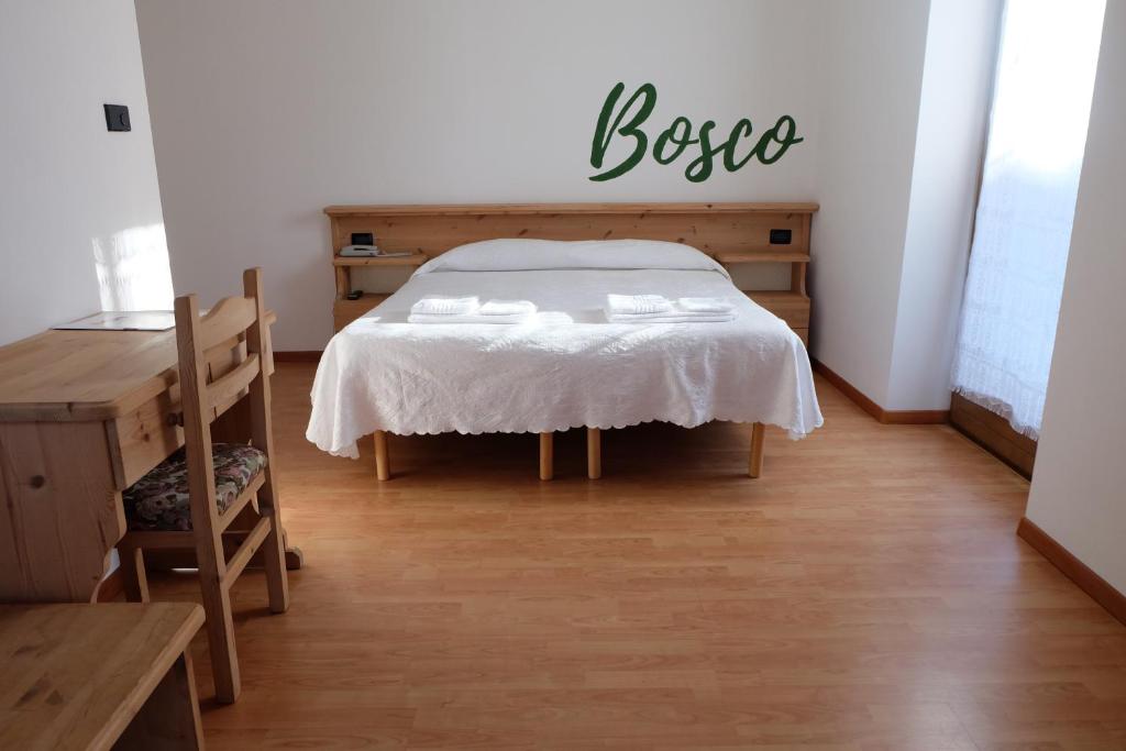 Postel nebo postele na pokoji v ubytování Santorsola Relax Hotel
