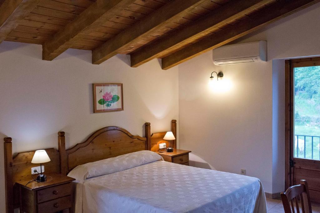 Postel nebo postele na pokoji v ubytování Mas El Ferrés