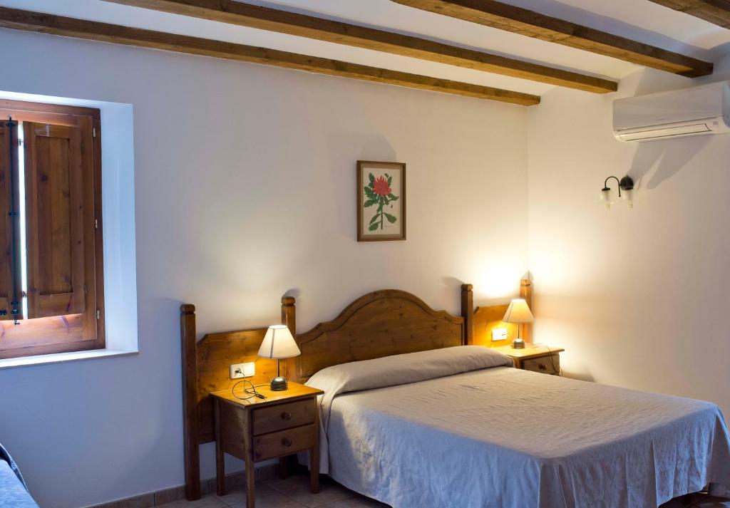 Postel nebo postele na pokoji v ubytování Mas El Ferrés