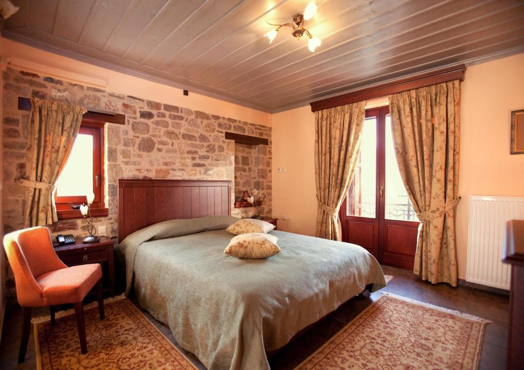 Ένα ή περισσότερα κρεβάτια σε δωμάτιο στο Amanites Guesthouse
