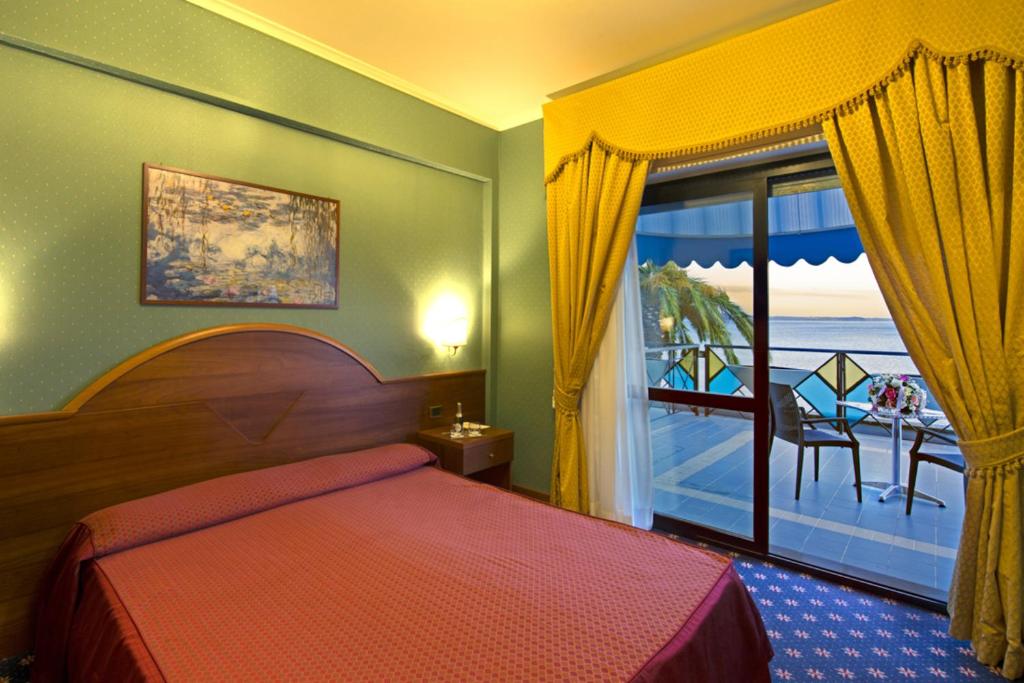 Postel nebo postele na pokoji v ubytování Hotel Lido - Beach and Palace